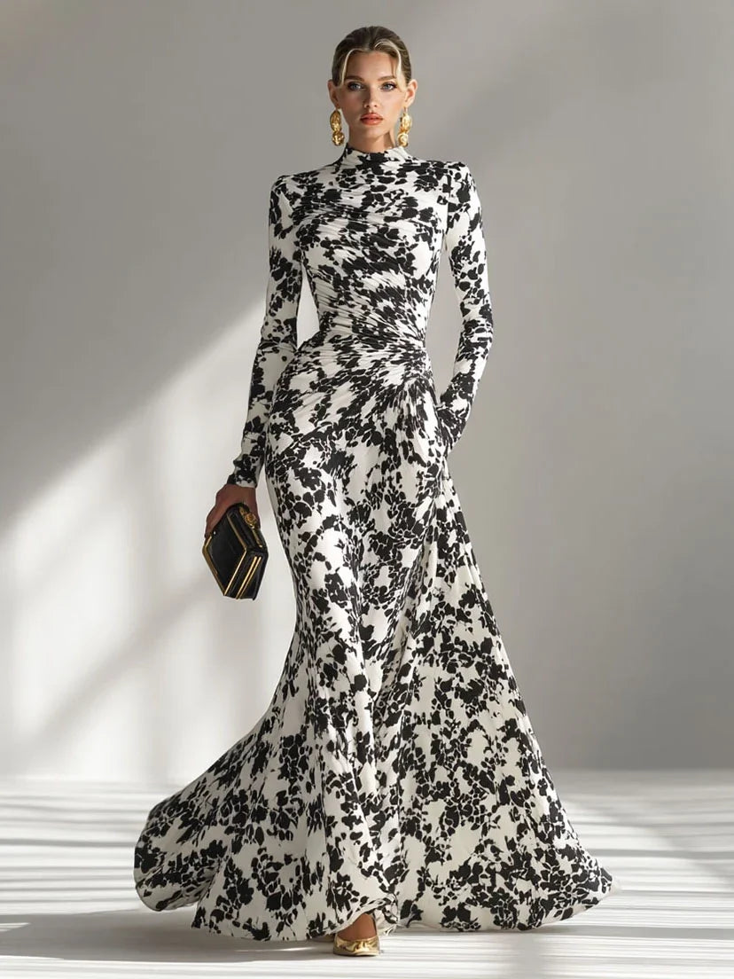 Model wearing the abstract floral mermaid maxi dress in Red