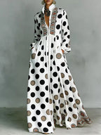 Elegant white long-sleeve maxi dress with pockets, front view