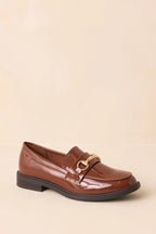 Women's It All Made Sense Brown Patent Faux Leather Loafers | Heel measures 1" 5