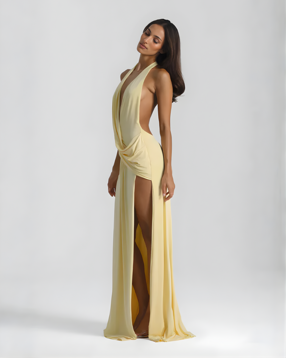 Open back design of the black evening maxi dress, rear view