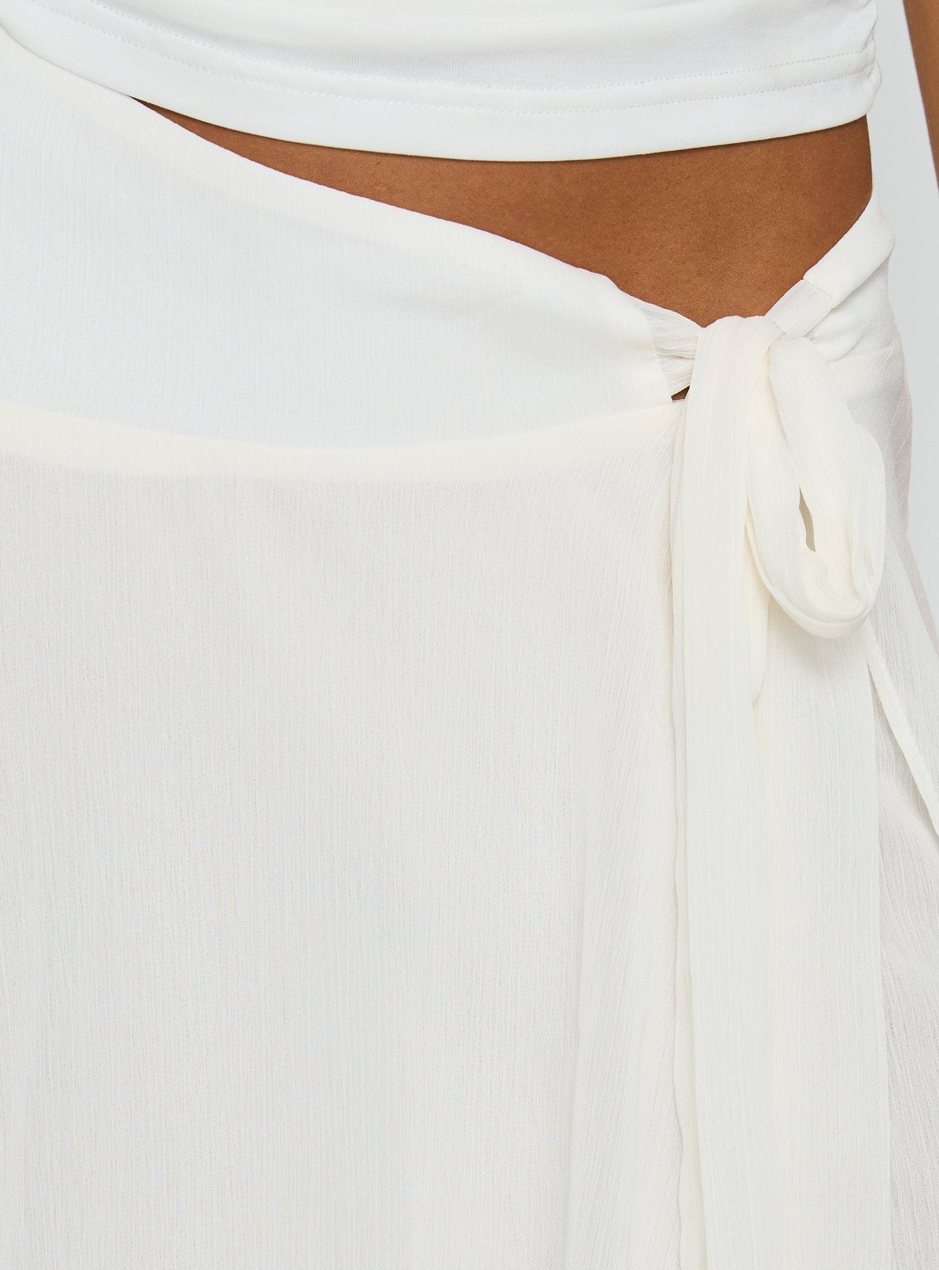 Cream chiffon midi skirt pleated hem detail