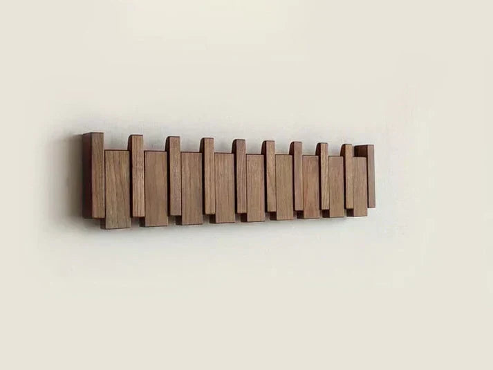 Wooden piano-shaped coat rack lifestyle
